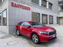 Red Mobility-Fahrzeug an einem Mobility-Standort